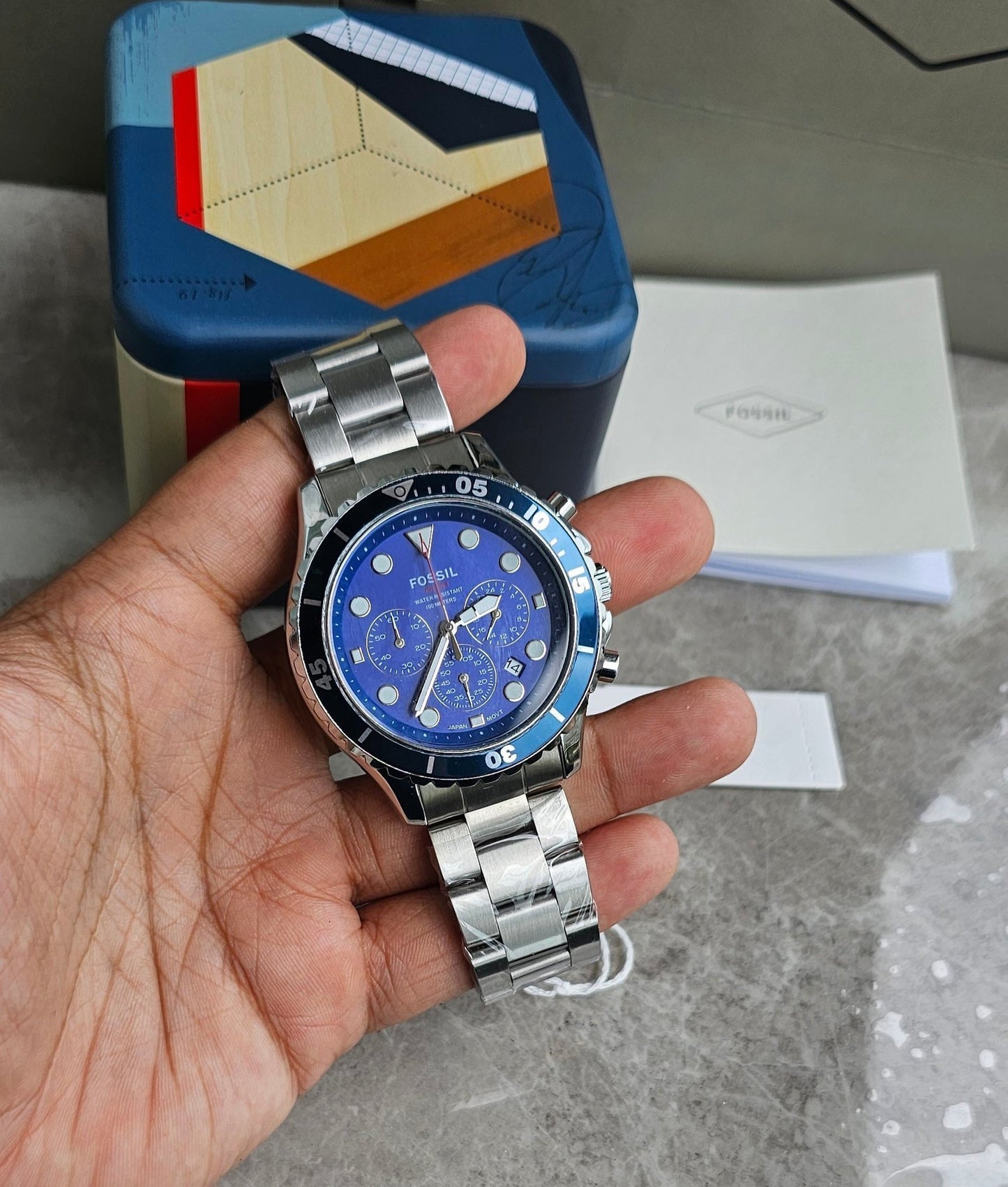 Rolex Submarine yellow gold and a blue dial date comInline Delivery Info